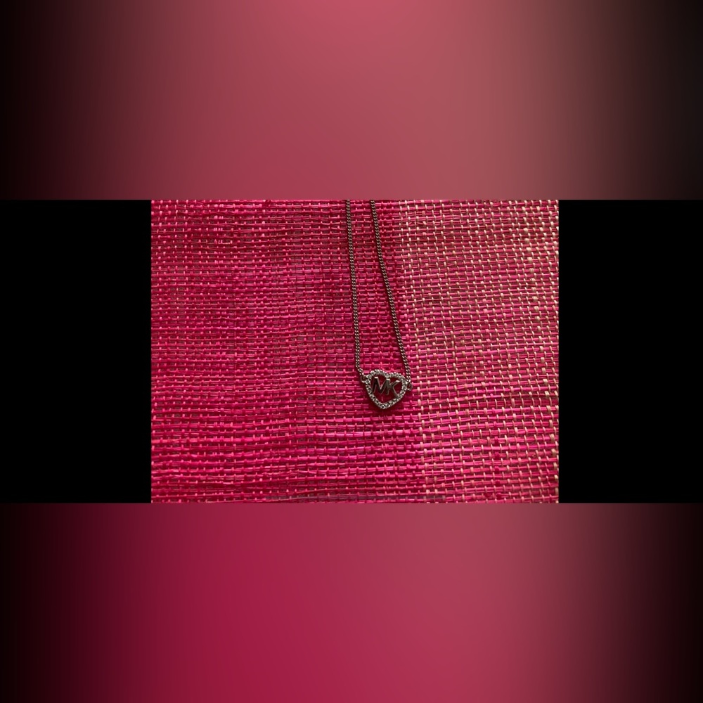 Michael Kors adjustable Sterling silver heart necklace.